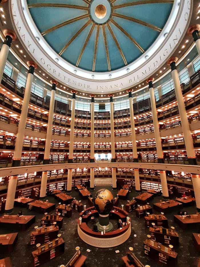 Explore the grand architectural design of Ankara's stunning circular library interior with a central globe.